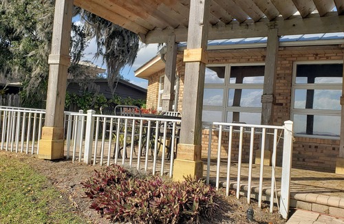 St. Cloud House | Enjoy fabulous lake views from your porch while sipping on a morning coffee.