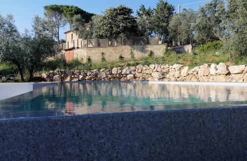 Roccastrada House | Equipped glamping tent and infinity pool in a Tuscan olive grove
