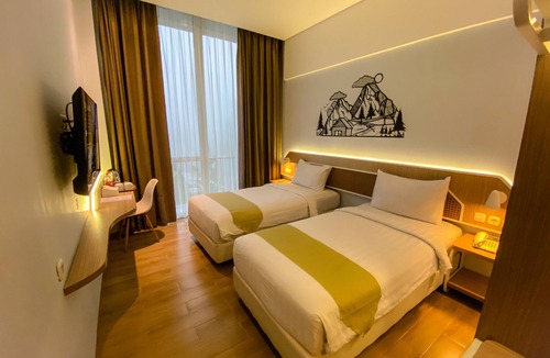 Hargomulyo Hotel | Facade Hotel by Azana