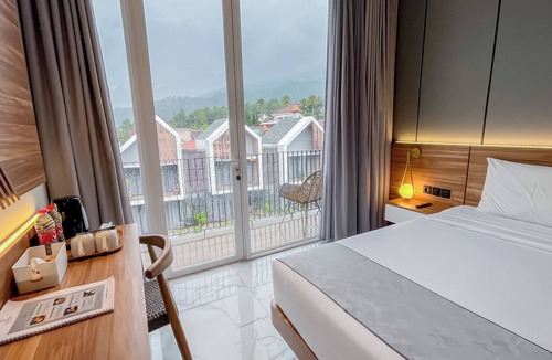 Hargomulyo Hotel | Facade Hotel by Azana