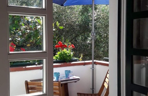 Quercianella Apartment | Fantastic view, private garden, air conditioning, WIFI