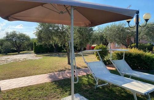 Montinelle Apartment | Flowers & garden apartment con vista lago
