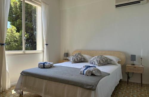 Mazzaro Apartment | FronteMare & MariMare Isola Bella Apartment by Taormina Holidays