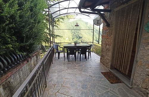 Stazzema House | Gabberi's Breeze is located in a hamlet of houses on a hillside with a sea view