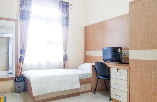 Jambi Hotel | Griya De Riz Syariah Mitra RedDoorz
