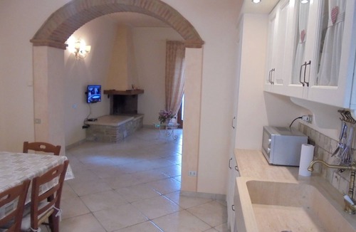Chianni House | Ground floor apartment with loggia and garden, panoramic view