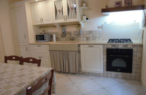 Chianni House | Ground floor apartment with loggia and garden, panoramic view