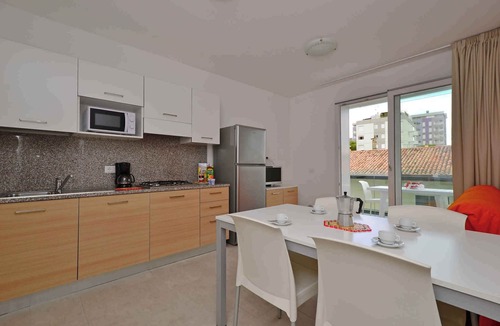 Lignano Sabbiadoro Apartment | Holiday apartment with air conditioning, internet, balcony and pool