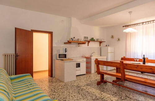 Fauglia House | Holiday Home 'Poggio1' with Shared Pool, Shared Garden and Wi-Fi