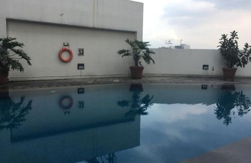 Braga Apartment | Homey and Cozy 1BR Apartment at Braga City Walk By Travelio