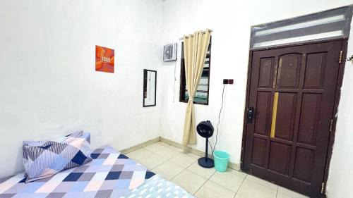 Gubeng House | Homey Guesthouse Gubeng Syariah