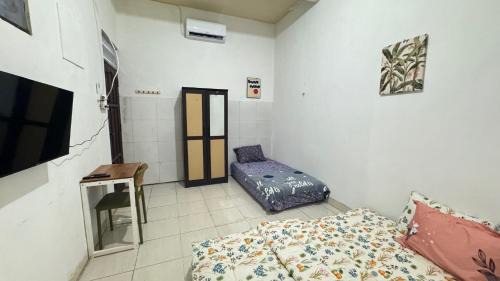 Gubeng House | Homey Guesthouse Gubeng Syariah