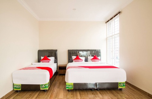 Medan Hotel | Hotel O Adam Malik Guesthouse Near Stasiun Medan