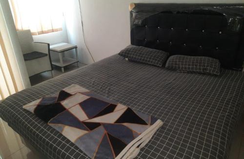Karawang Hotel | Hotel O Apartemen Grand Sentraland by Mira