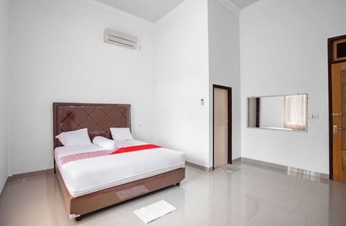 Jambi Hotel | Hotel O Homestay Romauli Kampung Radja