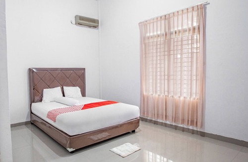 Jambi Hotel | Hotel O Homestay Romauli Kampung Radja