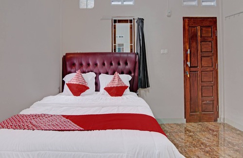 Pekanbaru Hotel | Hotel O Putri Homestay Syariah Near SPBU 14.282.694 (Air Hitam)