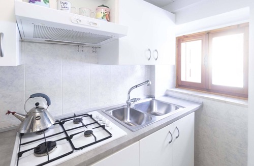Marone Apartment | LOVELY APARTMENT IN AN ANCIENT HAMLET WITH LAKE VIEW AND PATIO