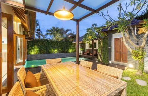 Sunset Road Villa | Luxurious and Cozy King Beds, Pool, closed living room