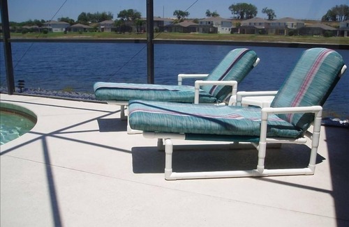 Sunset Lakes Villa | Luxury 5BR/3.5BA Villa, 2 Masters - Lakeside Pool & Games Room.
