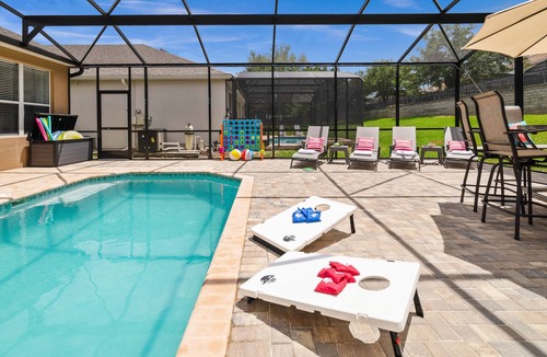 Windsor Hills House | Magical 5 bedroom villa, extended pool deck and movie theatre room near Disney