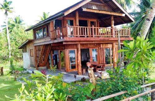 Pulau Masokut House | Mentawai Balcony - Beachfront family surf resort with stunning ocean views
