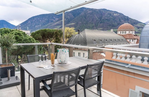 Merano Apartment | Merano center penthouse with terrace, garage, bike room and infrared sauna.