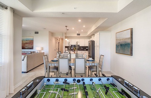 Kissimmee Condo | Modern Storey Lake Condo, 5 mi to Disney, Foosball, Giant Water Slide