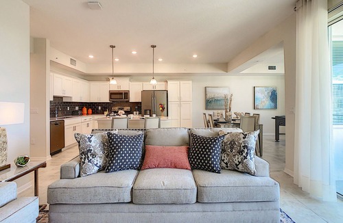 Kissimmee Condo | Modern Storey Lake Condo, 5 mi to Disney, Foosball, Giant Water Slide