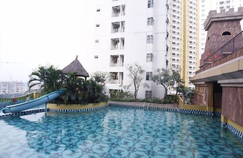 Panunggangan Utara Apartment | Modern Studio Grand Serpong Apartment By Travelio