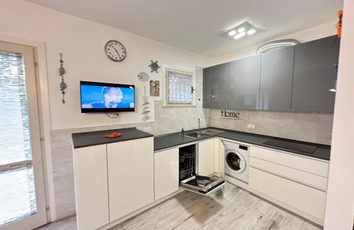 Bibione Villa | Modern two level villa with playground and pool