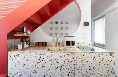 Udine Apartment | NEST LIVING Red Velvet