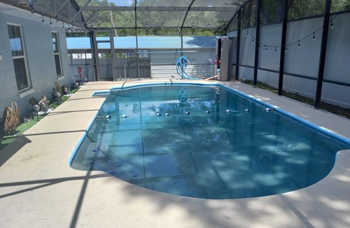 Pine Hills House | New Listing: Universal Disney and Waterpark Vacation Station 4 Bedroom Pool Home