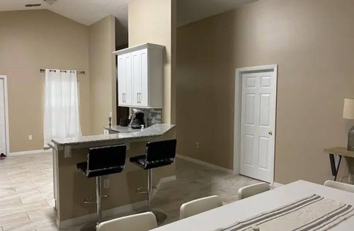 Crescent Lakes House | Newly renovated Lakefront Villa with private heated pool!