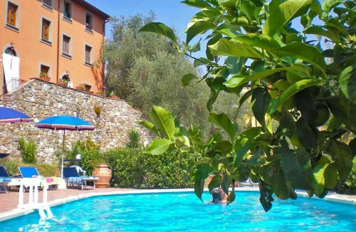 Massarosa House | Nice apartment in villa with pool, internet, TV, terrace, pets allowed, parking, close to Viareggio