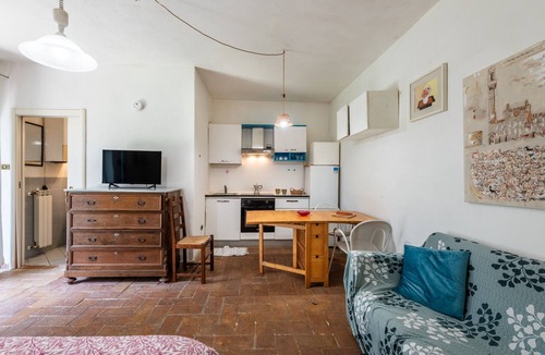 Siena Apartment | ‘Nido Blu Loft’ Apartment with Shared Pool, Private Garden, and Wi-Fi