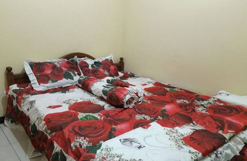Banjarasri Hotel | OYO Homes 91083 Desa Wisata Plosokuning Syariah