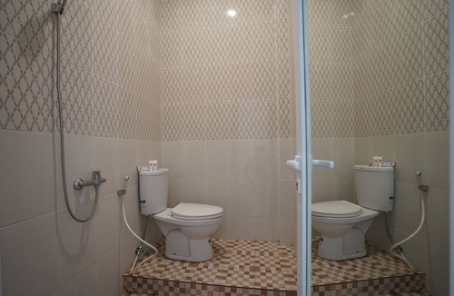 Sukarami Hotel | OYO Life 1299 Balcony Orange Homestay