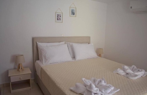 Kamari Apartment | Plethora Home: Quiet With Terrace in Traditional Kamari - bus Stop 3min Away