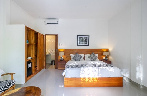 Batubelig Hotel | Puri Uma Ratu - Deluxe Room 02