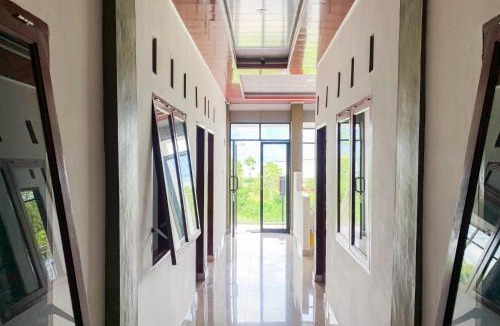 Ambarita Hotel | RedDoorz at Exaudi Homestay Parbaba Samosir