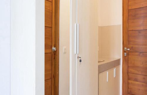 Taman Griya Apartment | RedDoorz Plus at Kencana Residence Jimbaran