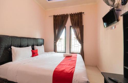 Bukittinggi Hotel | RedDoorz Syariah at D'Ostha Residence