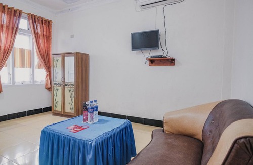 Gunung Sugih Hotel | RedDoorz Syariah near Kebun Raya Liwa