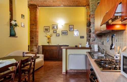 Castiglione della Pescaia Apartment | Room 'La Mangiatoia' with Shared Terrace, Shared Garden and Wi-Fi