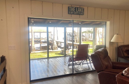 Clermont House | Secluded lake front w/private dock, boat lift, large screened porch