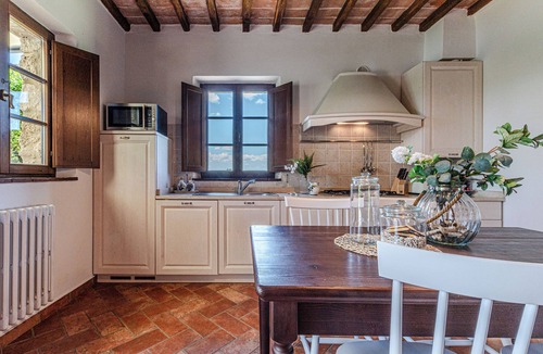 Asciano Apartment | Short Rentals Siena-Le Rose, apartment with pool nestled in the Crete Senesi