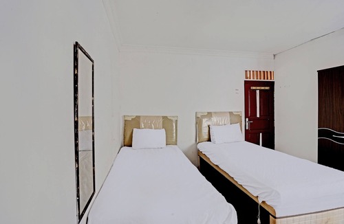 Kotabangun Hotel | SPOT ON 92529 Penginapan Wisma Bintang Syariah Near MTs Al Ma'arif Kota Bangun