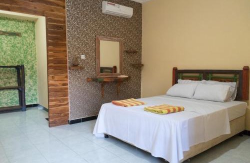 Tukad Mungga Bed & Breakfast | Sunrise Lodge & Lounge