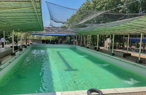 Sangkanurip Hotel | Taman Wisata Siwalk Cottage Syariah RedPartner
